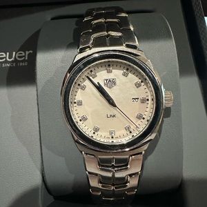 Womens tag watch with diamonds